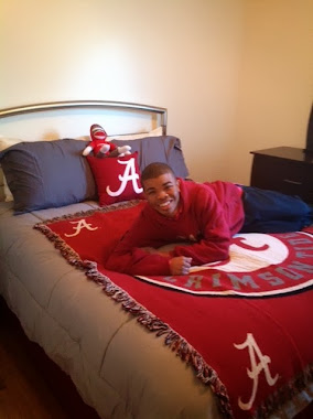 He loves his new Roll Tide room!