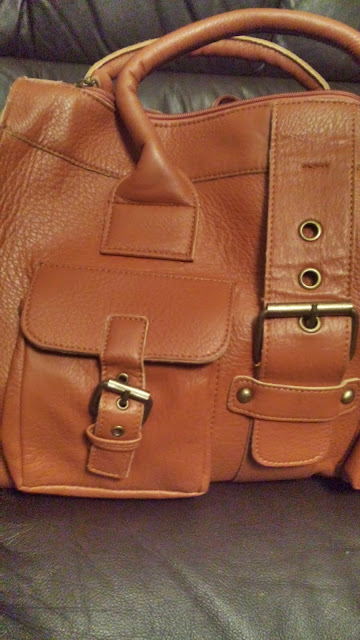 http://www.dresslily.com/buckle-and-solid-color-design-handbag-for-women-product174789.html