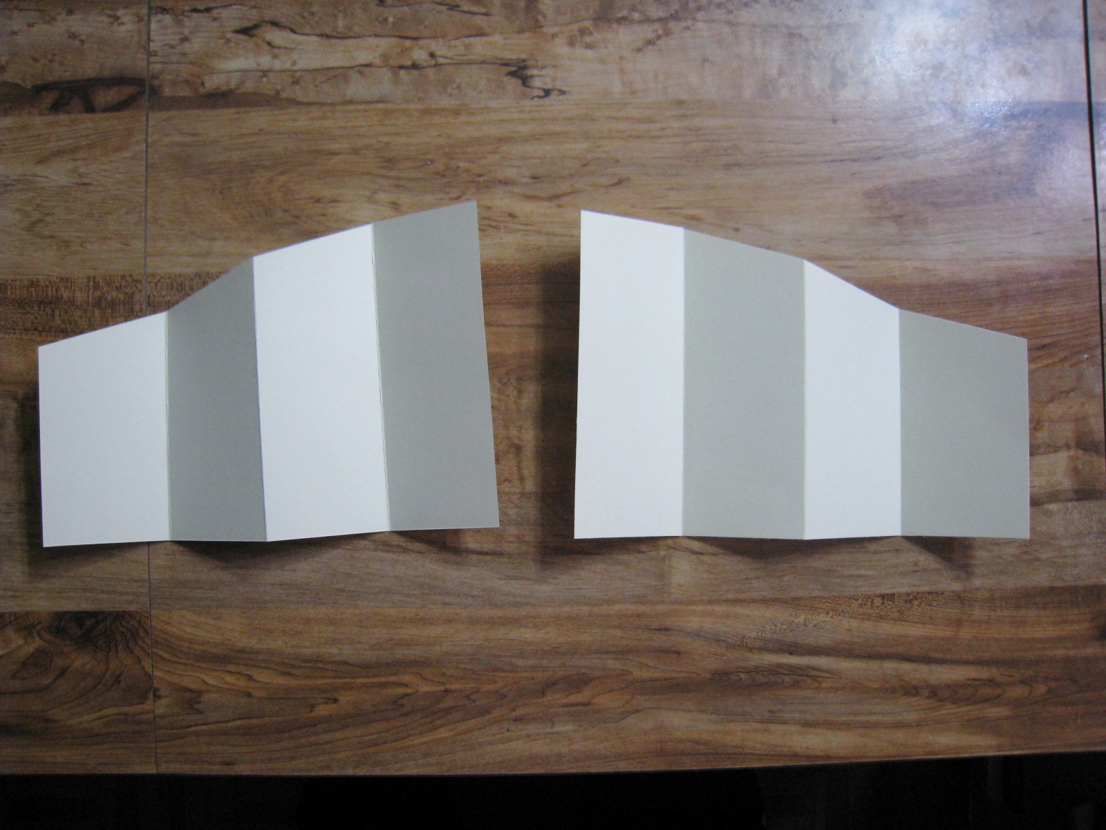 I attached each accordion piece to the front of my card using my pink