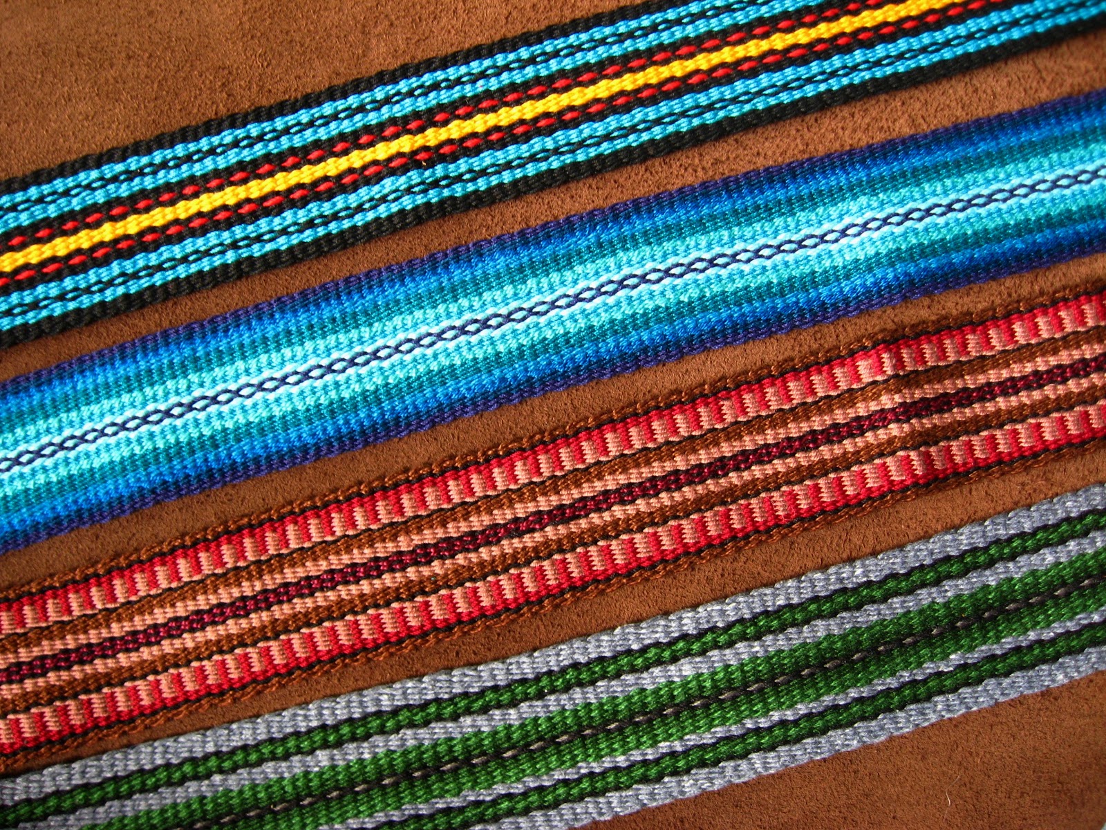 ASpinnerWeaver New Collection of Guitar Straps The chain gang!