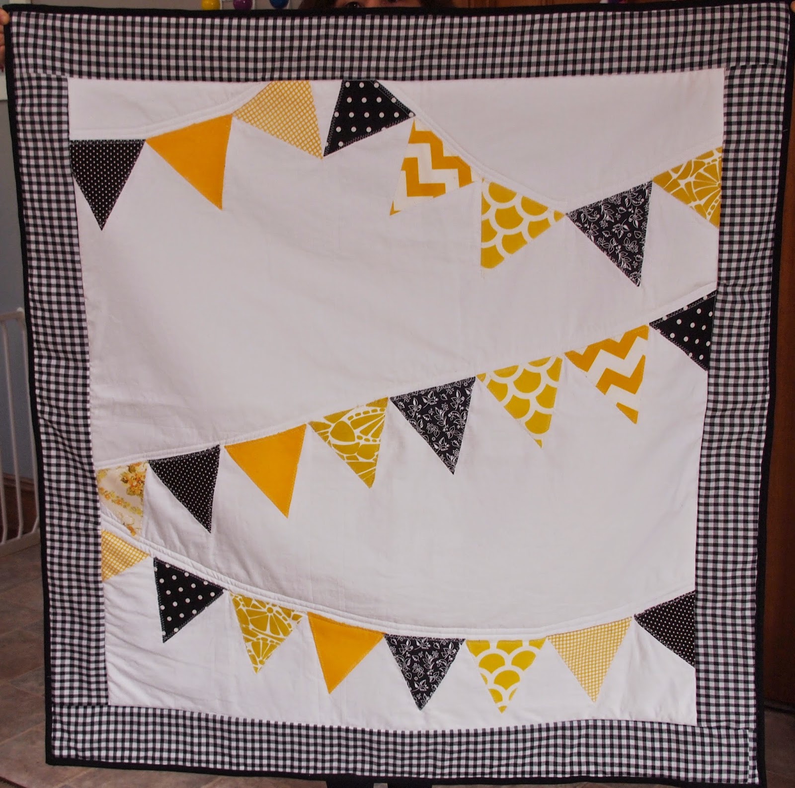 THE THRIFTY CHALLENGE A pennant quilt.