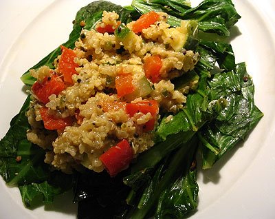 Millet-Quinoa Hash with Peppers and Zucchini on Sautéed Greens