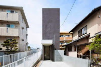 Shiga Narrow Urban Promenade House Design With Concrete Walls And Upper Bridge Shiga Narrow Urban Promenade House Design With Concrete Walls And Upper Bridge