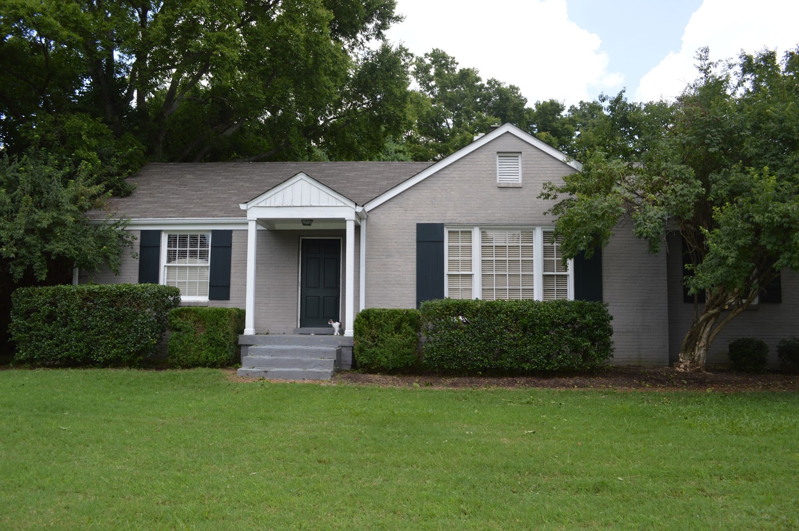 Sylvan Park Life Prepping the Brick Exterior for Paint