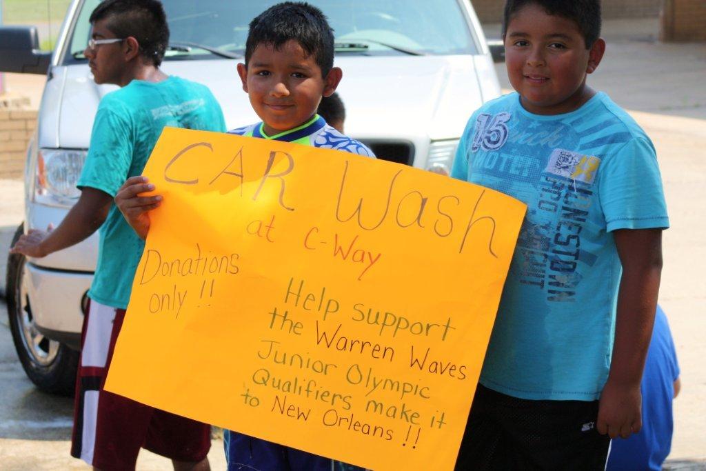 Sports Warren Waves Host Car Wash to Raise Funds for Jr. Olympics