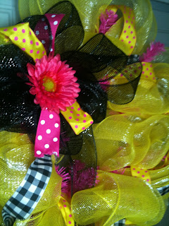 black and yellow mesh wreath