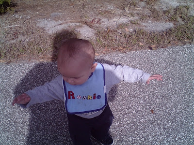 Baby balancing while walking