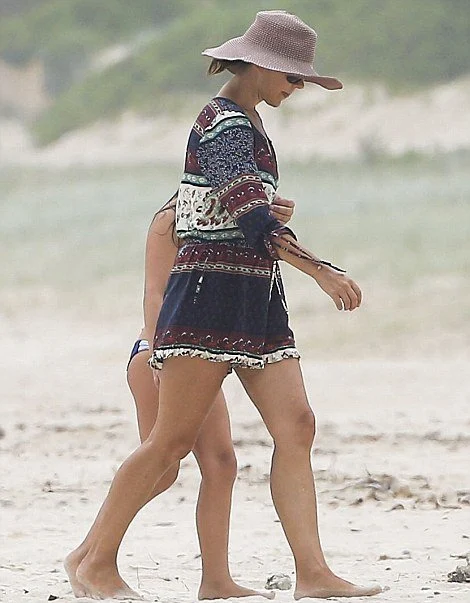 Crown Princess Mary of Denmark hits the beach again in Byron Bay. Walking barefoot along the sand she was accompanied by eight-year-old daughter Princess Isabella