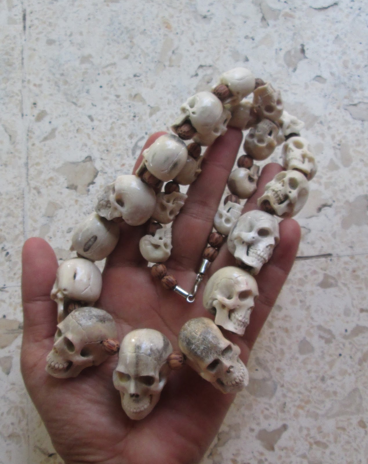 Skull Necklace Carving in Antler Skull Necklace Carving in Antler