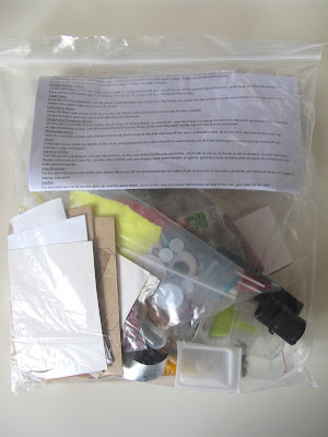 Bag of 'trash to treasure' bits to make dolls' house miniatures.