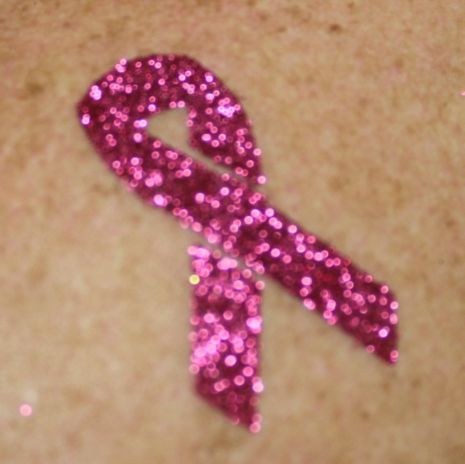 http://1.bp.blogspot.com/-O7jq9YWP0iE/UG7po_0OCgI/AAAAAAAAHgM/lktYunkefus/s1600/pink_ribbon_glitter_tattoo.jpg