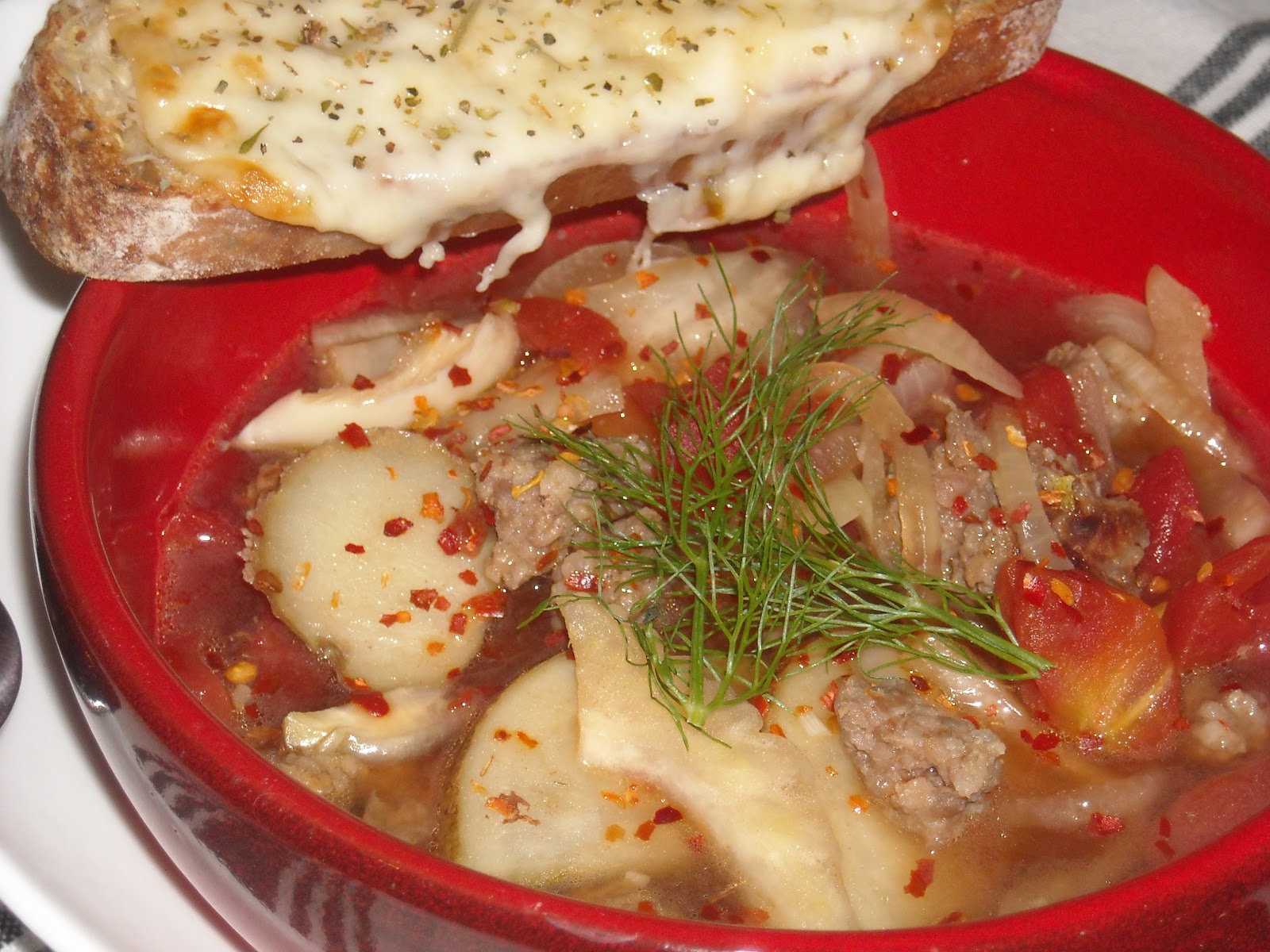 Leave a Happy Plate Spicy Sausage, Potato, and Fennel Soup with Cheesy