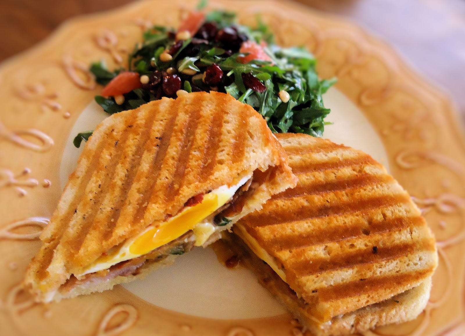 Veronika Eats Prosciutto, Fontina Cheese, and Fried Egg Paninis