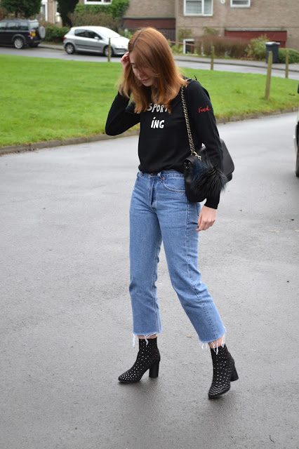 Bella freud jumper from Fred perry, Blue vintage Levis 501 with black studded boots from ASOS. Mulberry style bag with river island pom pom. Affordable women's fashion blog. Alexa chung style. Vogue  