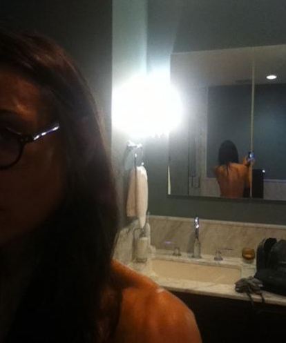 Demi Moore tweets self photo topless in bathroom