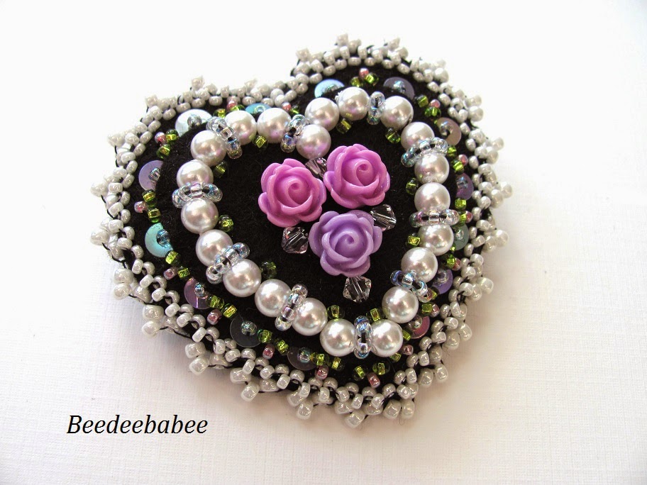 black heart brooch