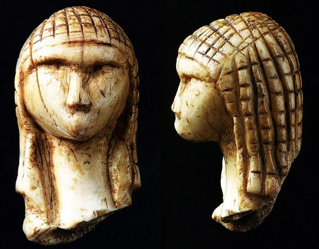 Venus of Brassempouy - ivory figurine earliest known realistic human face and mother goddess figurine, circa 25.000-22.000 BC, from, Gravettian period, discovered Cave of Brassempouy, France