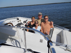 Rafted snugly to YA's 'hip', these 4 boaters enjoyed the ride home.