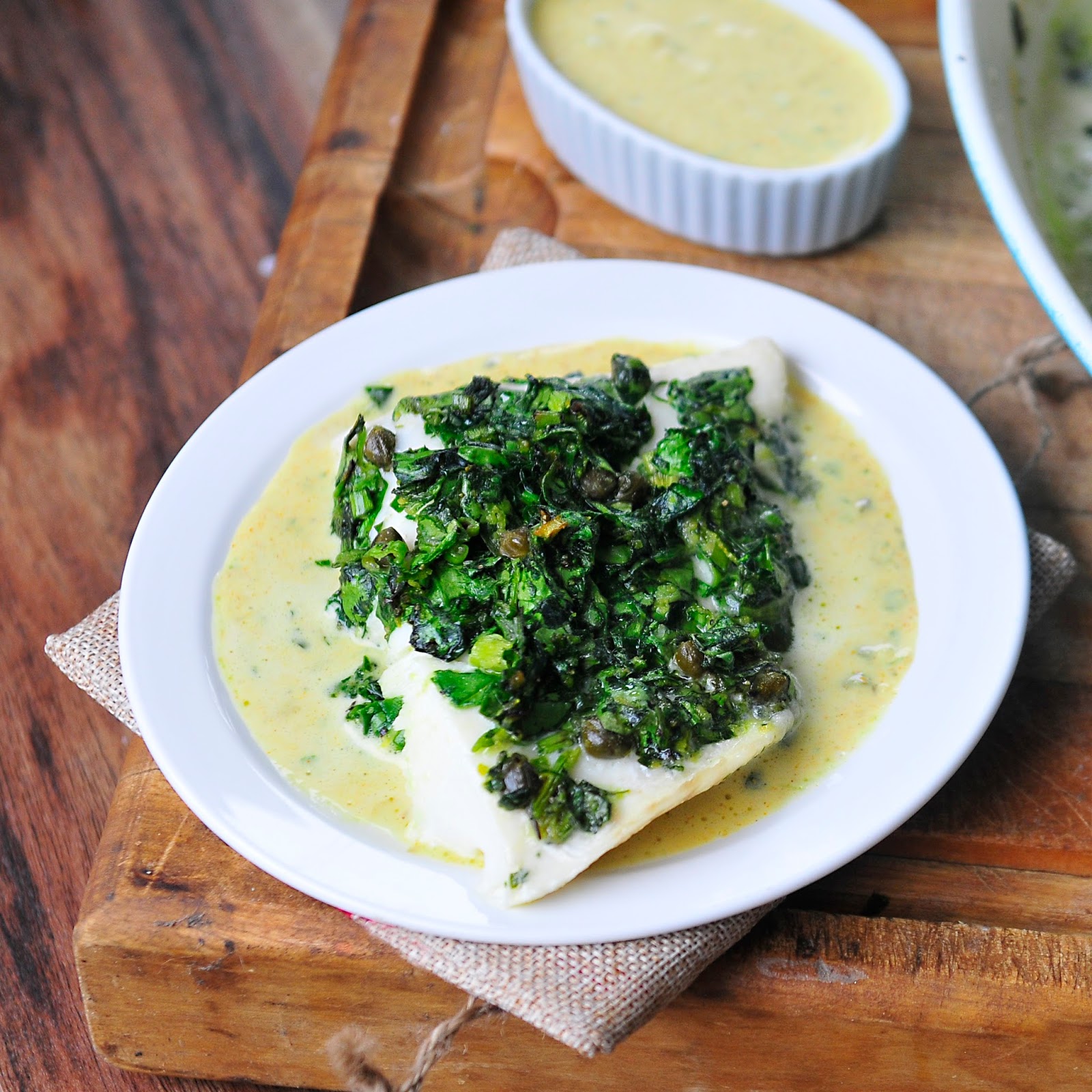 Simply Gourmet Oven Poached Halibut with Spinach, Parsley, and Capers