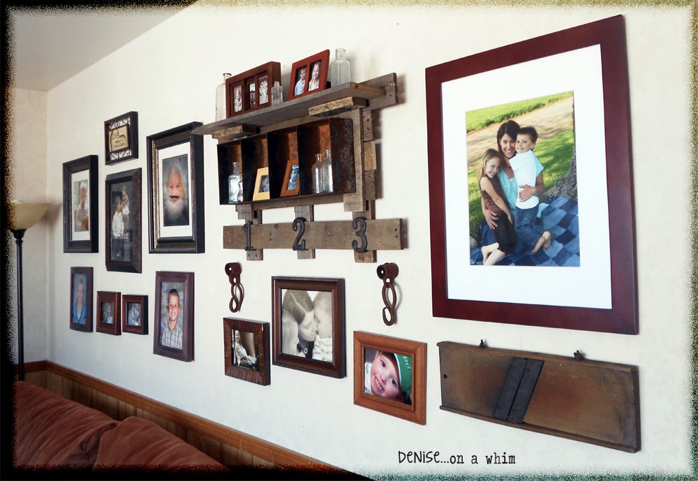 A rust and pallet wood combo make for a warm addition to this gallery wall via http://deniseonawhim.blogspot.com