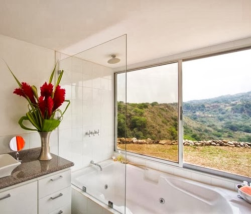 13-Bath-with-a-View-Recycled-Container-House-Architect-Benjamin-Garcia-San-Jose-Costa-Rica-Solar-Panels-Recycled-Metal-www-designstack-co