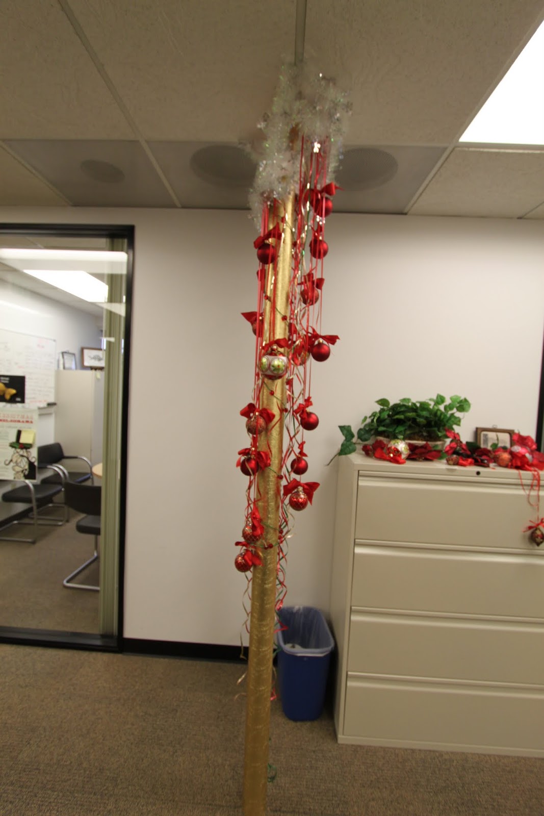 the office holiday pole decorating contest midcentury modern remodel