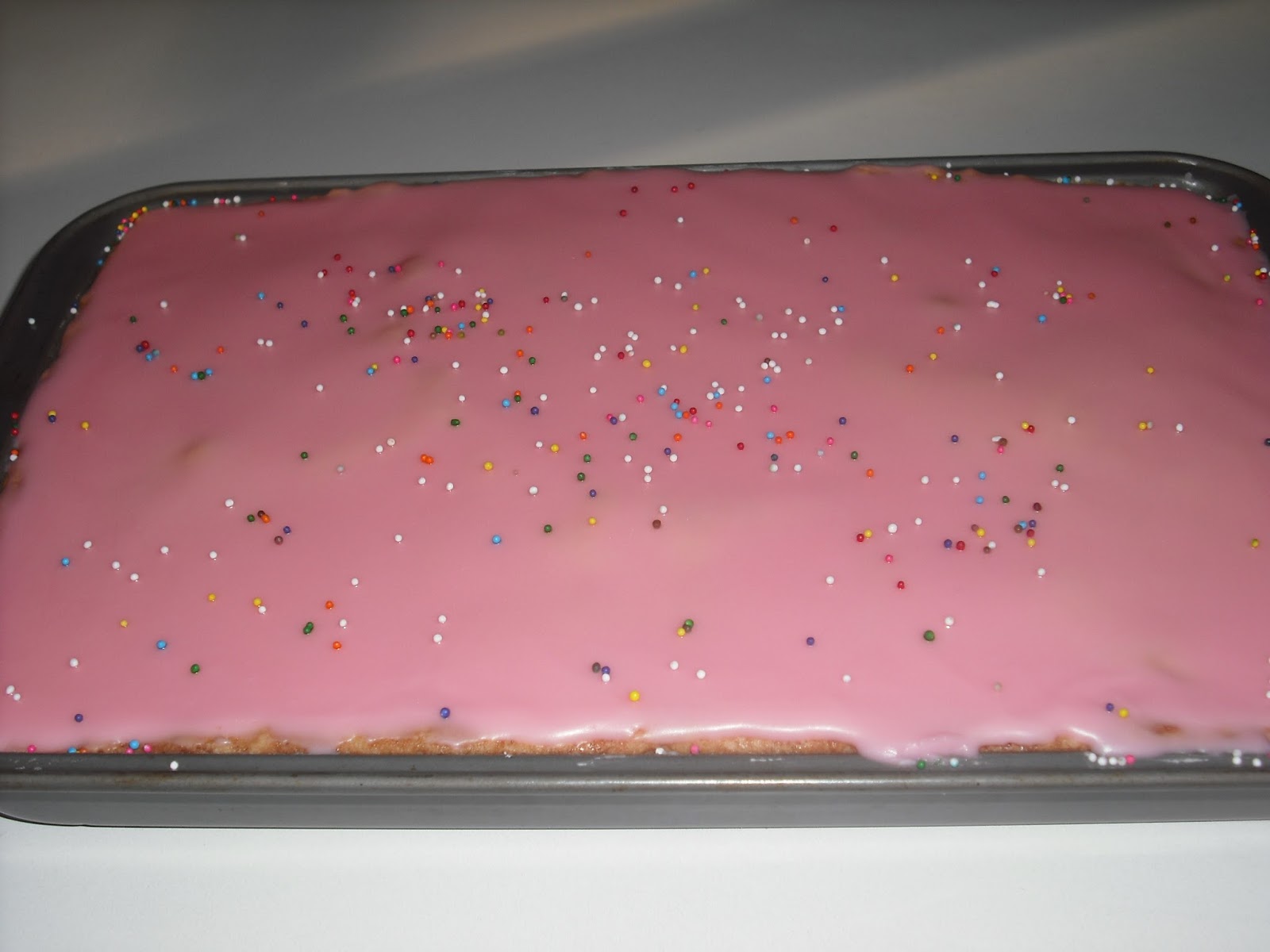 Recipe Marketing Snack Cake With Pink Icing