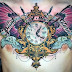 Wall clock tattoo with feather