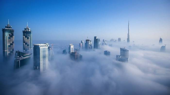 Dubai-based German photographer Sebastian Opitz captures the surreal and mystical look of his adopted city as fog rolls in and out at sunrise. The photographer renames the cityscape as Cloud City for the brief moments when the mist takes over and fills the empty space between the towering buildings. Optiz's images offer a serene and dreamy view of a bustling city, re-imagining it as a heavenly metropolis in the sky.