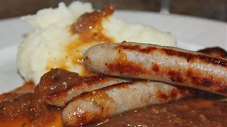 SAUSAGE AND MASH WITH ONION GRAVY