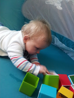 tummy time, baby building blocks, sensory toys, not crawling