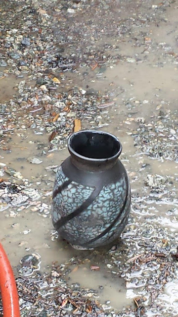 A beautiful naked raku pottery pot.