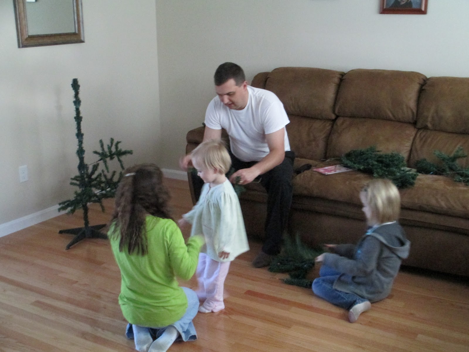 Our Little Family Putting up our Christmas Tree
