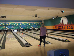 One of her friends bowling