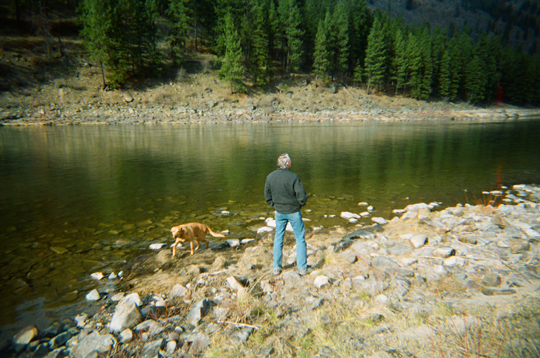with dog on Clark Fork river