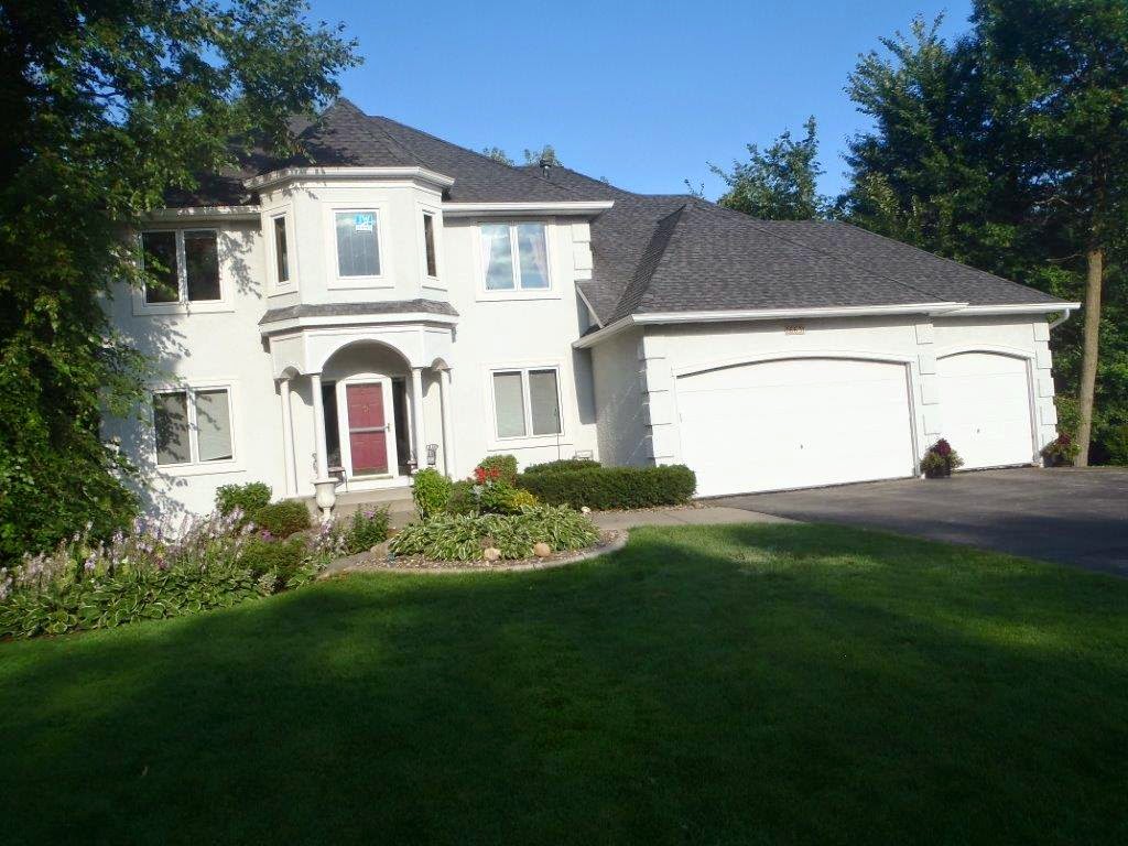 16631 Isosceles in Lakeville. Traditional cement stucco finish with