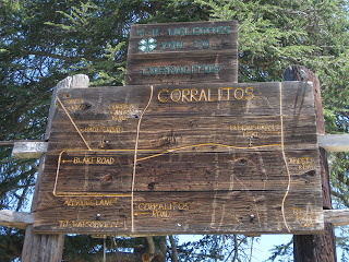 Rustic wooden signs, 4-H Welcomes You to Corralitos / Area Map