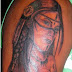 índia tatuada no braço