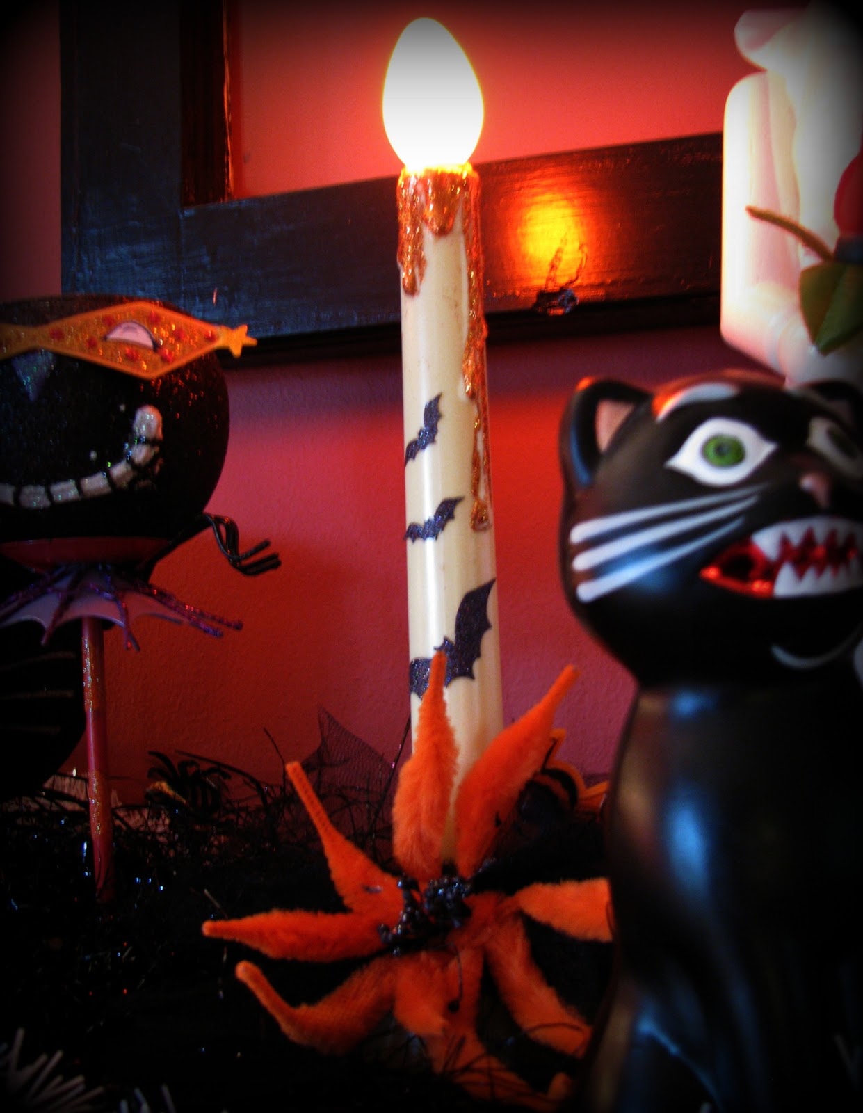 Musings from Kim K. Halloween window candles...