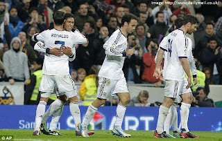 Raphael Varane and Cristiano Ronaldo celebrating the goal against Barcelona