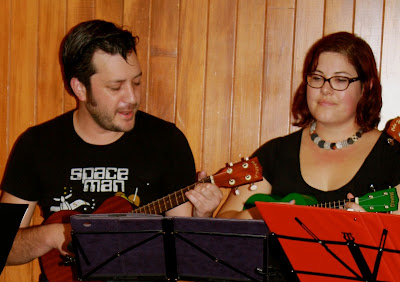 Jeremy, singing, and me, looking worried.