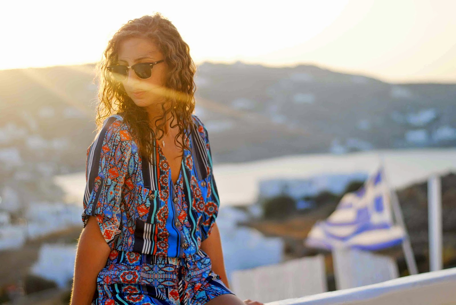 mykonos greece blue paisley romper ray ban clubmaster curly hair
