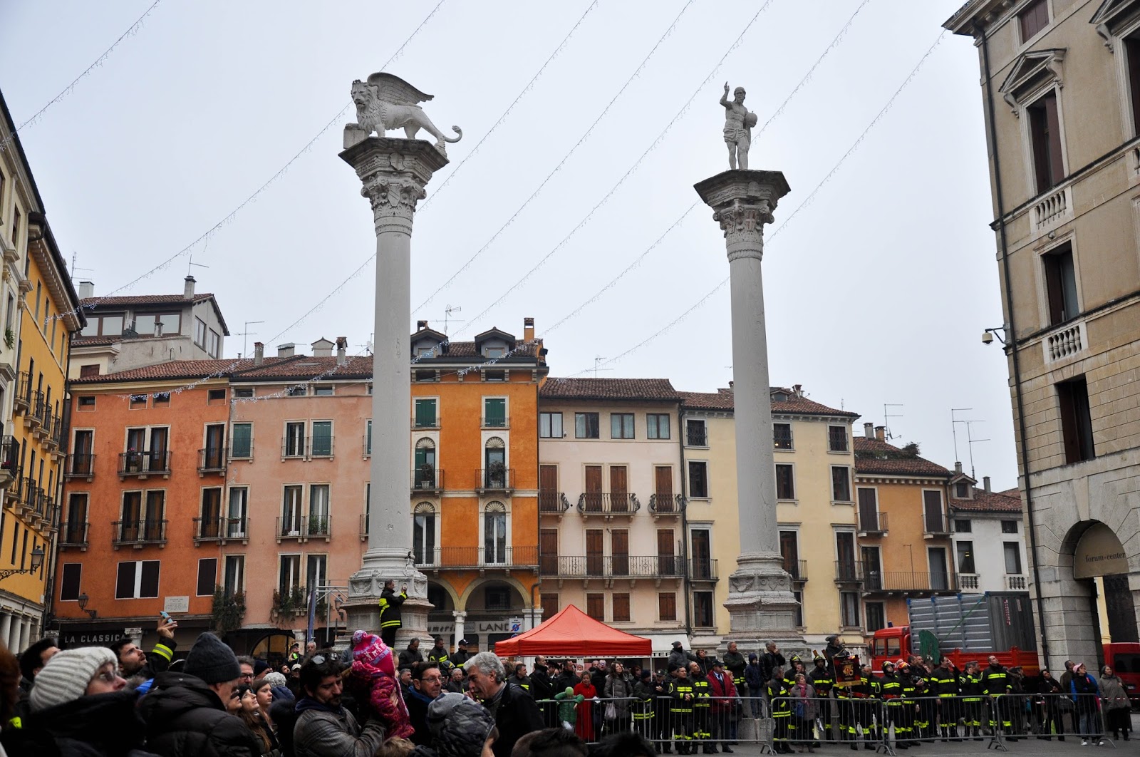 The crowd watching the demonstration of the firefigters on Piazza dei Signori, Saint Barbara celebration, Vicenza, Veneto, Italy