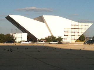 a white building with a curved roof