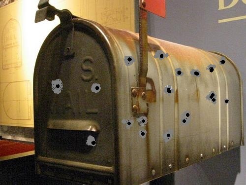 Bulletholes In the Mailbox