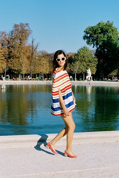 Hanneli Mustaparta wearing blue and red striped dress