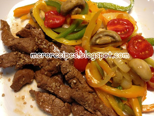Sliced beef with pepper and mushrooms