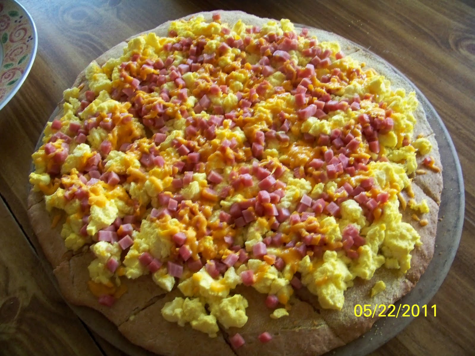 Connor's Cooking Scrambled Eggs and Cheese Pizza