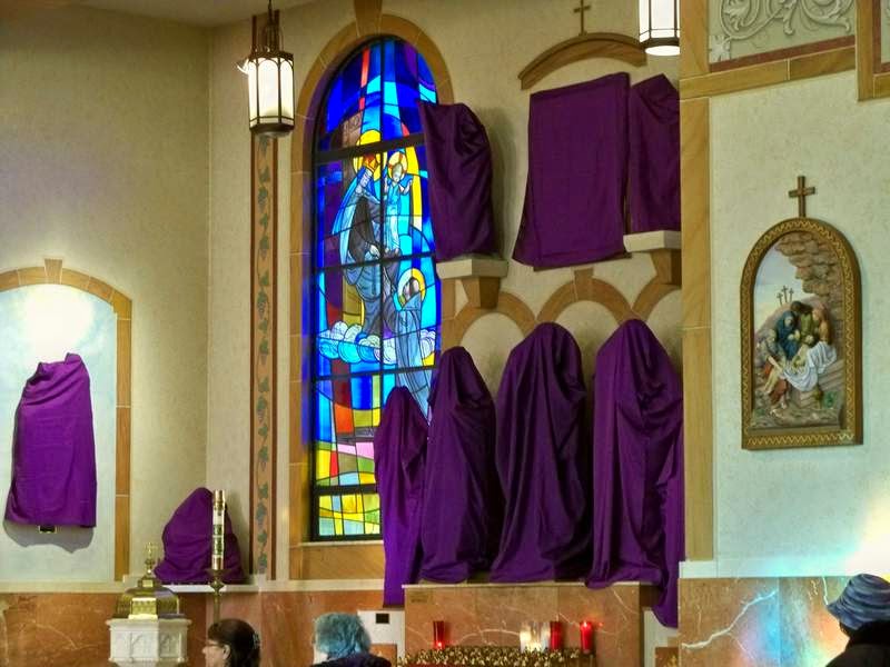 a voice from the rustbelt shrouding of crucifixes and statues