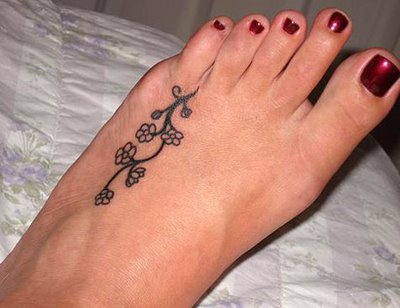 girly tattoos on feet